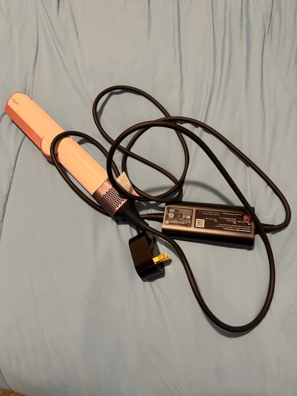 Dyson hair styler in pink and black